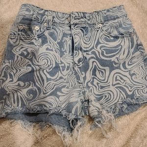 denim shorts with swirl pattern